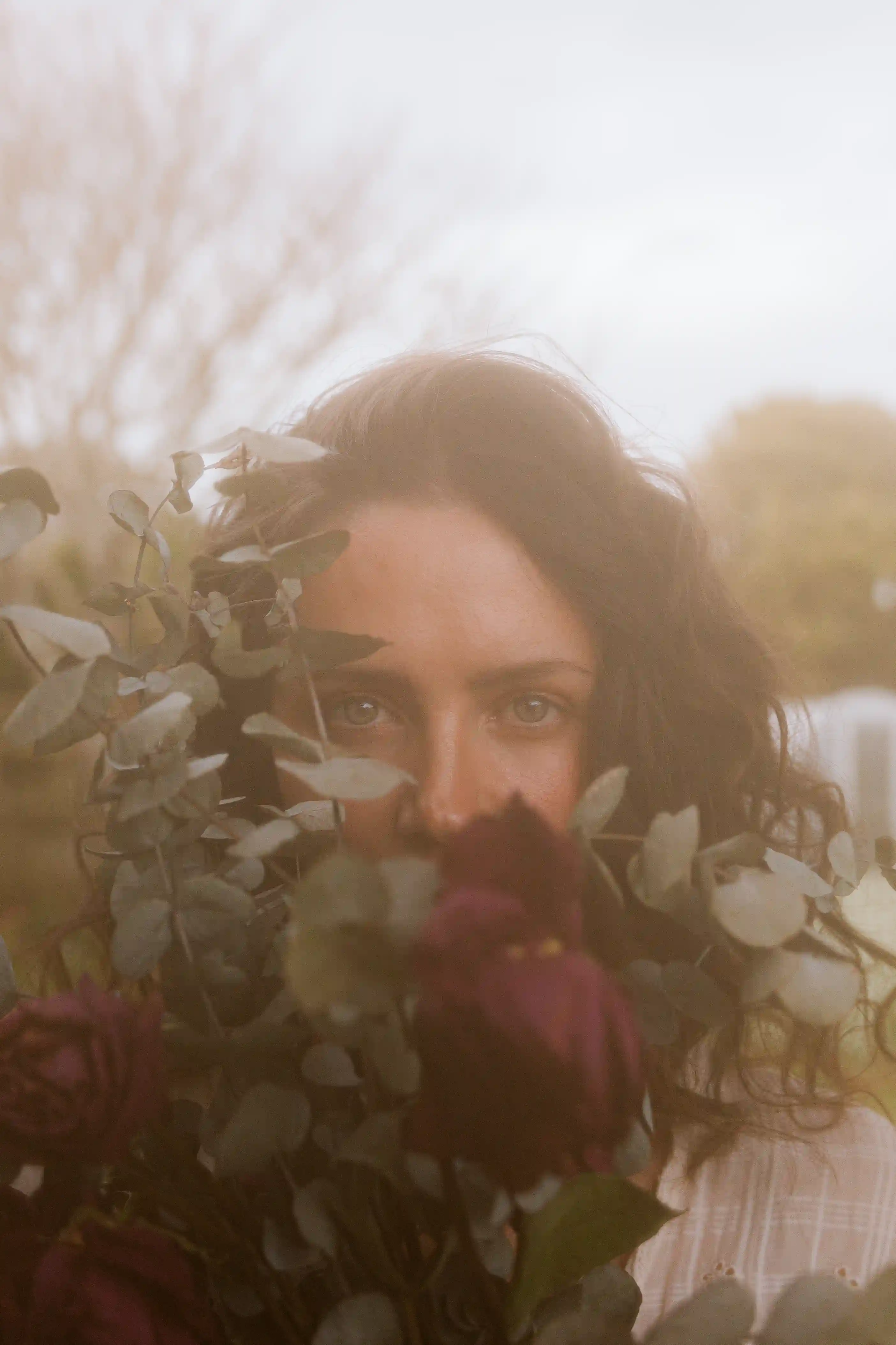 Wedding photography New Plymouth - bride and groom share a quiet moment in coastal light