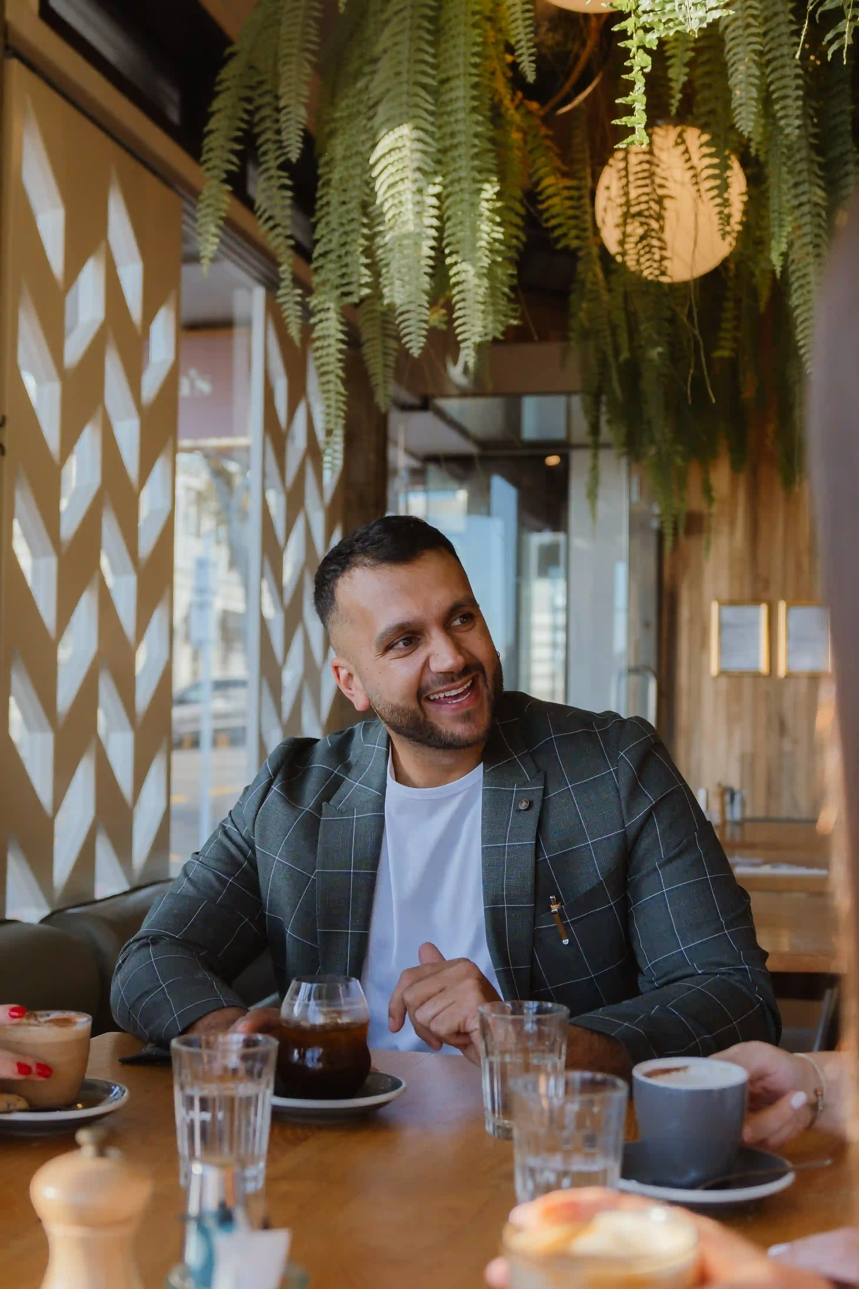 Branding photography New Plymouth - hands styling product details during a branding shoot